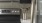 a kitchen with black cabinets