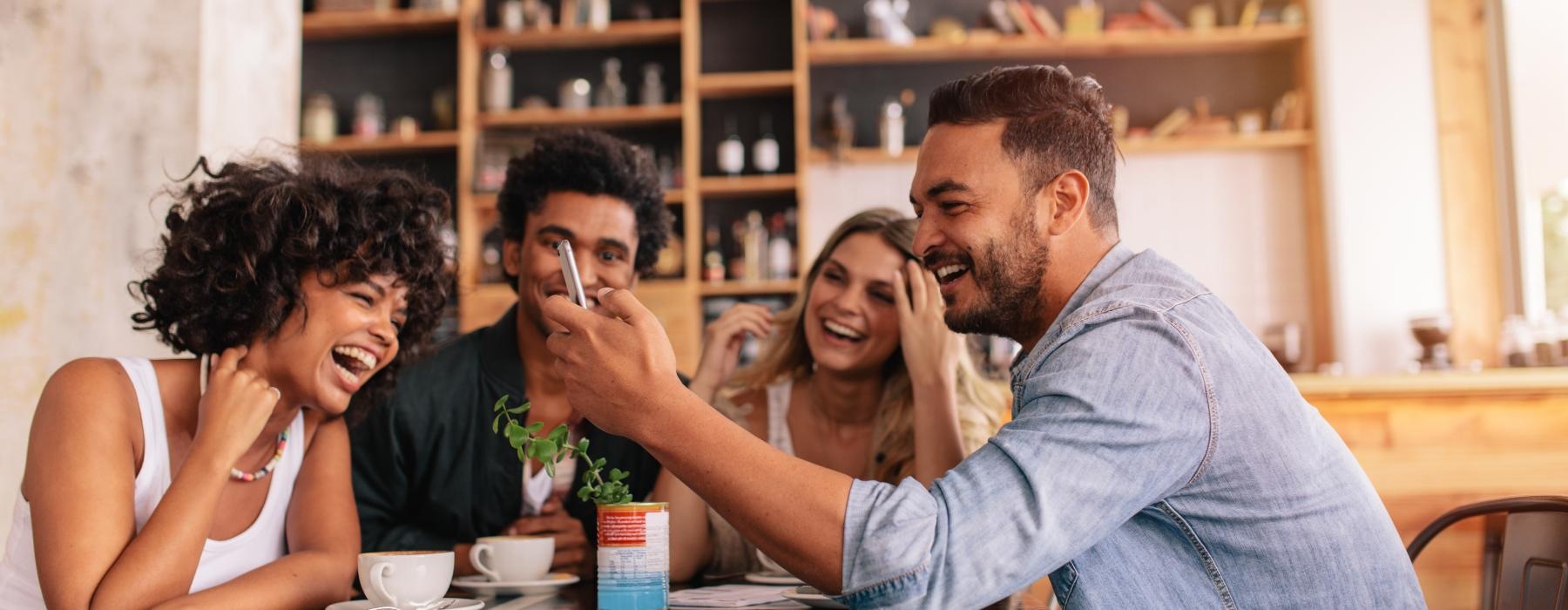 a group of people sitting at a table