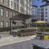 a courtyard with chairs and tables
