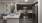 a kitchen with a table and chairs